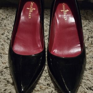 Cole Haan Glossy Black Heels with Bold Red Insole